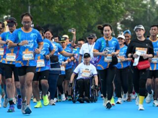 Pelari disabilitas ikut berlari di Run for Equality 2026 dok Plan Indonesia